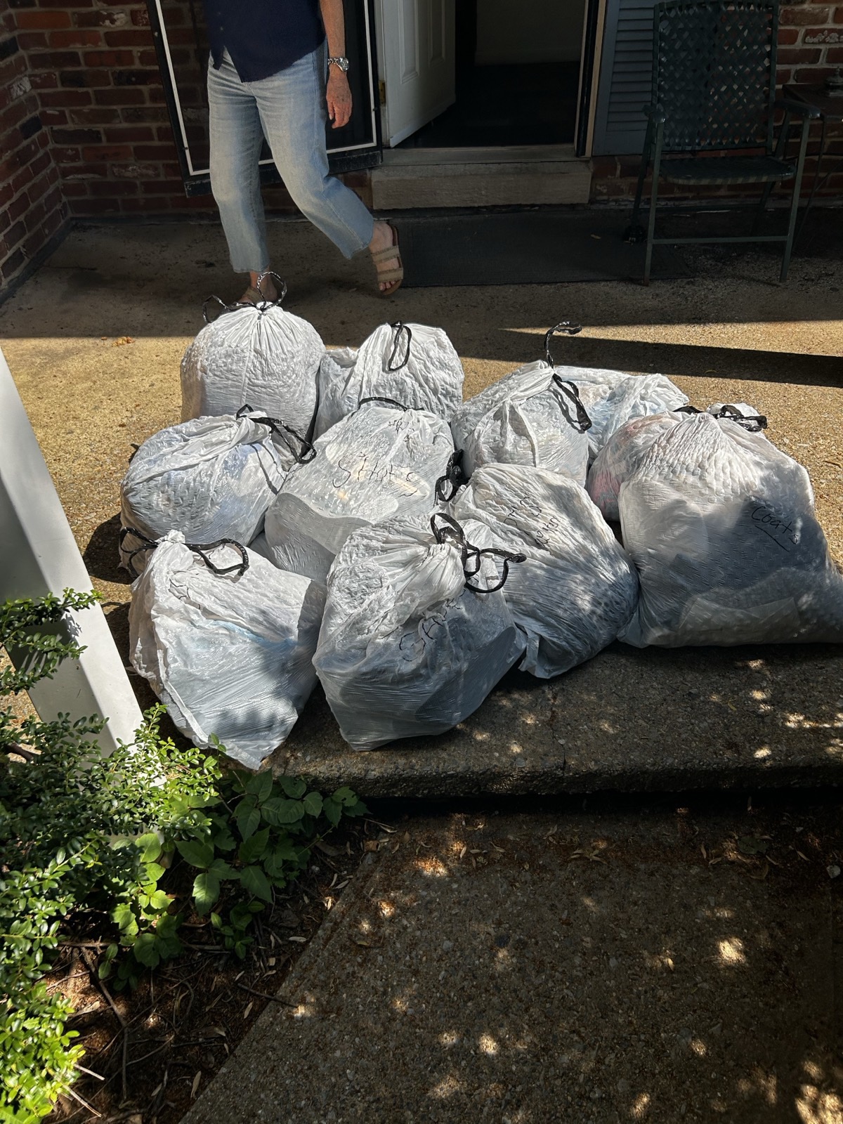 Bags of folded clothing donations collected at a free doorstep donation pickup in West Chester PA