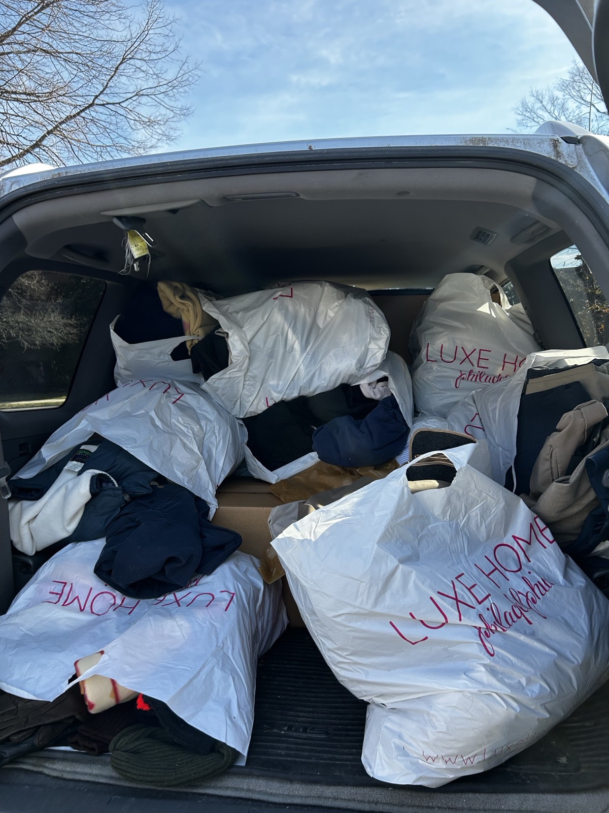 Vehicle packed with clothing donations for delivery to Chester County families and shelters