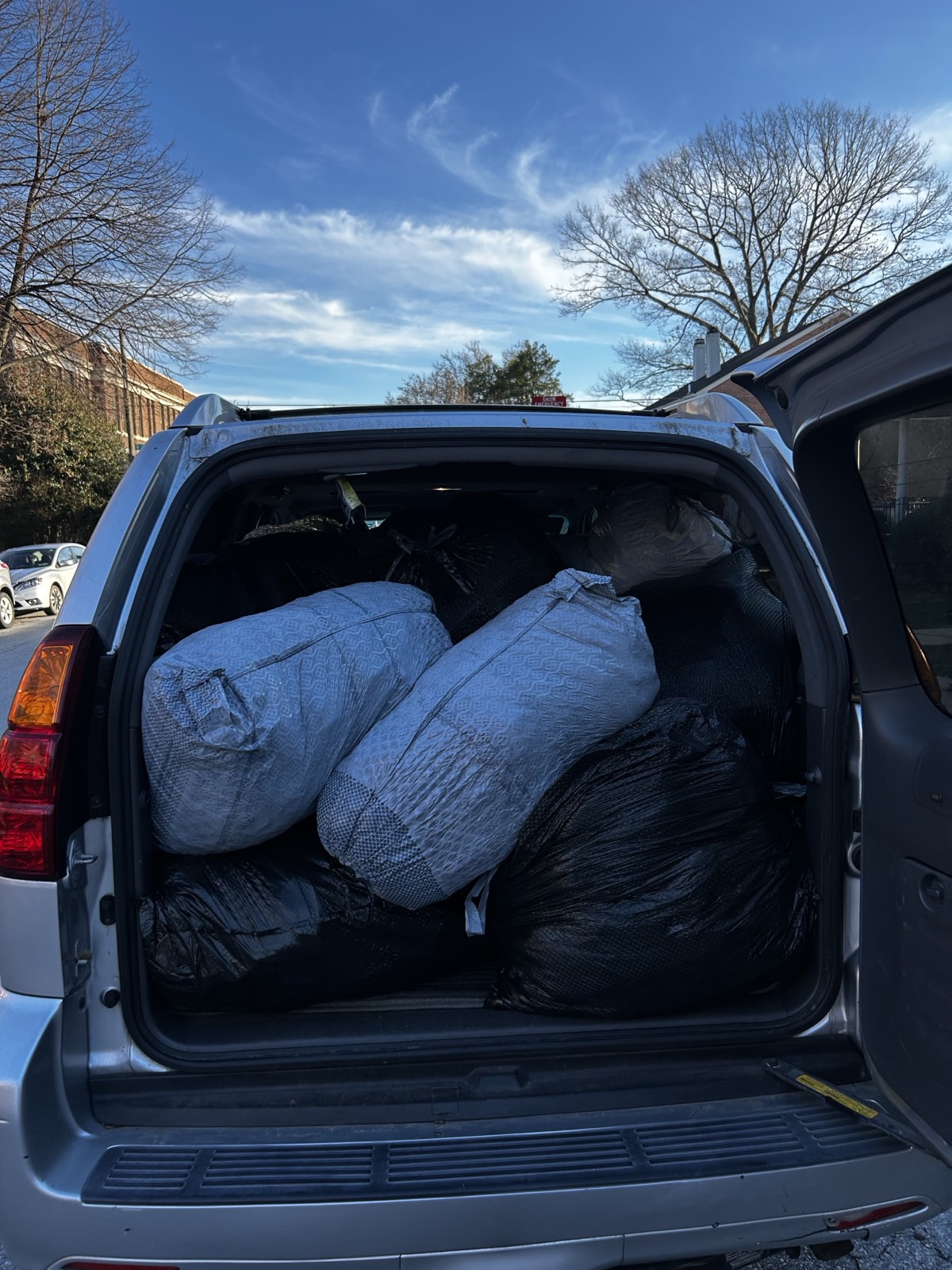 SUV loaded with clothing donations headed to St Agnes Parish and The Wardrobe